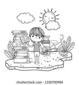 happy little boy reading book with bicycle in the field