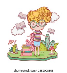 happy little boy reading book in the garden