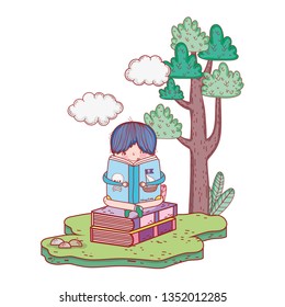 happy little boy reading book in the landscape