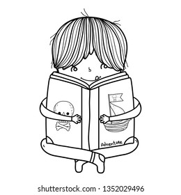 happy little boy reading book