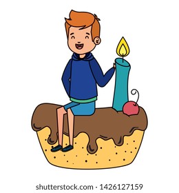 happy little boy seated in cake with candle