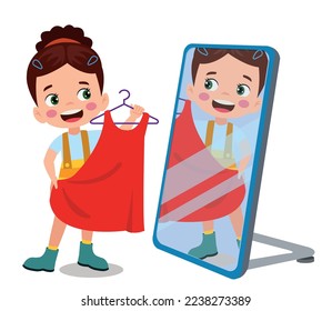 happy little boy standing in front of mirror looking his reflection with new clothes