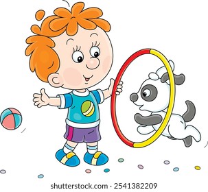 Happy little boy with a toy hoop playing and training his cheerful small puppy, vector cartoon illustration on a white background