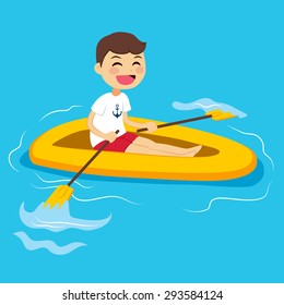 Happy little boy in water with yellow rubber boat rowing