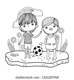 happy little boys playing soccer in the field