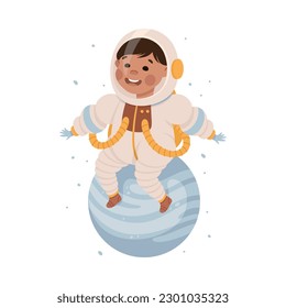 Happy little child in spacesuit sitting on planet. Kids astronaut character dreaming about adventures in outer space cartoon vector illustration