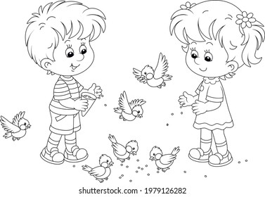 Happy little children feeding with corn a small flock of merry sparrows and titmice, black and white outline vector cartoon illustration for a coloring book page