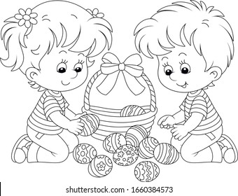 Happy little children putting painted eggs in an Easter basket decorated with a beautiful bow, black and white vector cartoon illustration for a coloring book page