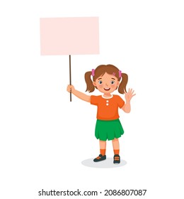 happy little girl holding empty banner or sign board with  blank space for copy space, text, messages, and advertisement