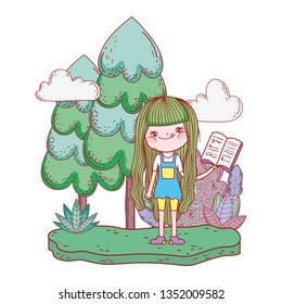 happy little girl reading book in the field