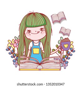 happy little girl reading book in the garden