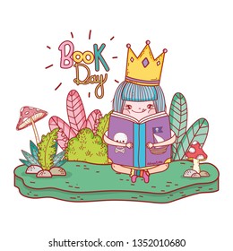 happy little girl reading book in the garden
