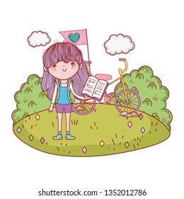 happy little girl reading book with bicycle in the field