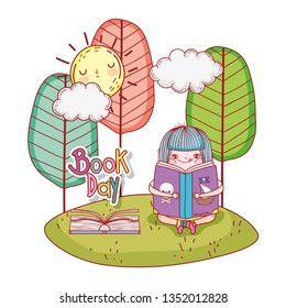 happy little girl reading books in the field