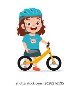 Happy Little Girl Rides Balance Bike Wearing Helmet, Enjoying Outdoor Activity and Smiling