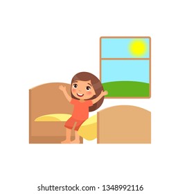 Happy little girl is sitting on the bed. Happy baby stretches. Day mode concept. Outside the window the morning sun shines. Cartoon vector character on a white background. Flat illustration.