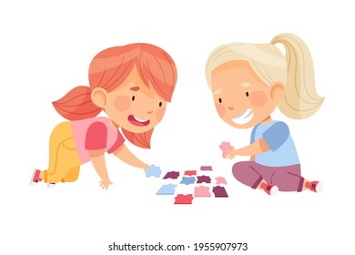 Happy Little Girls Playing Jigsaw Puzzle on the Floor Vector Illustration