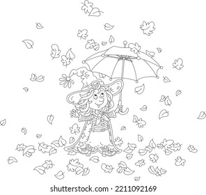 Happy little Halloween witch with a striped toy umbrella under falling and swirling autumn leaves, black and white outline vector cartoon illustration