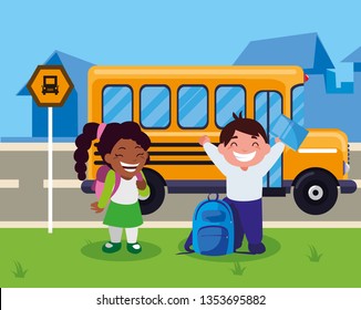 happy little interracial school kids in the bus stop