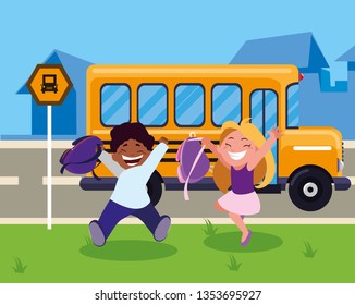 happy little interracial school kids in the bus stop