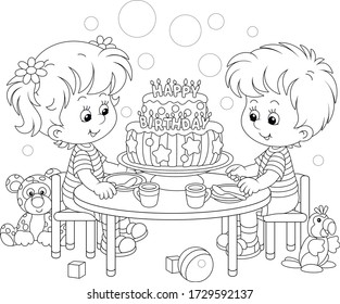 Happy little kids friendly smiling and sitting round their festive board with a fancy birthday cake decorated with letters candles, black and white vector cartoon illustration for a coloring book page