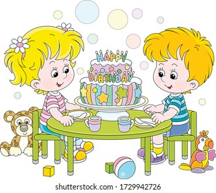 Happy little kids friendly smiling and sitting round their festive board with a fancy birthday cake decorated with colorful letters candles, vector cartoon illustration