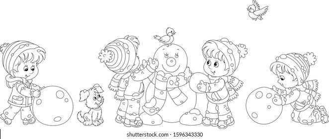 Happy little kids making big snow balls and sculpting a friendly smiling funny snowman with a striped scarf, black and white vector cartoon illustration for a coloring book page