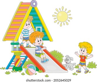 Happy little kids playing on a colorful toy slide on a playground in a green summer park on a sunny day, vector cartoon illustration isolated on a white background