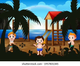 Happy little kids playing in the playground
