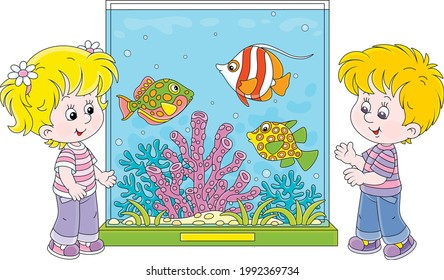 Happy little kids walking around a zoological garden and watching funny tropical fishes swimming in a large colorful aquarium with amazing corals, vector cartoon illustration