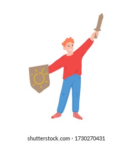 Happy little knight boy character with arm up holding wooden sword and shield. Vector illustration in cartoon style.