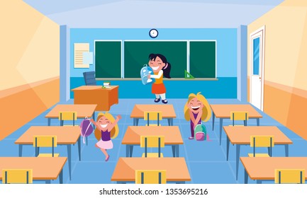 happy little school girls in the classroom