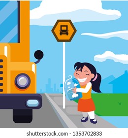 happy little schoolgirl with schoolbag in the bus stop