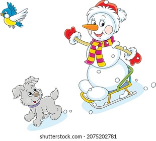Happy little snowman and a merry small puppy cheerfully sledding down a snow hill on a playground, vector cartoon illustration isolated on a white background