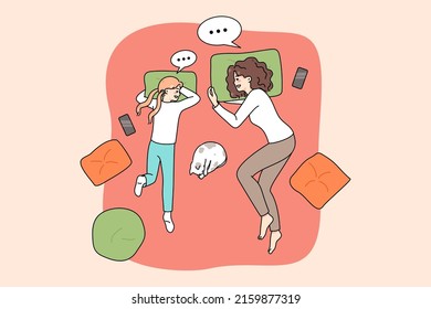 Happy loving young mother and teen daughter lying on bed at home chatting and talking. Concept of good parent child relationships. Mom and teenager have close relations. Vector illustration. 