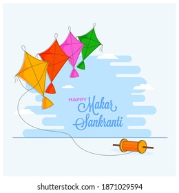 Happy Makar Sankranti Font With Colorful Kites And A String Spool On Light Blue Background.