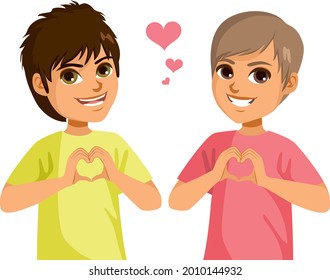 Happy male teenagers making love gesture joining hands in heart shape