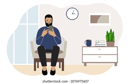 Happy man busy with mobile phone, sitting in a chair in the living room. Rest and work at home. Vector flat illustration