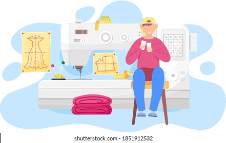 Happy man fashion designer is making a model, sitting near the sewing machine with pink cloth and looking at clothes pattern. Sewing workshop, atelier, custom clothing, weaver and a piece of cloth