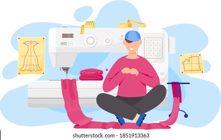 Happy man fashion designer is making a model, sitting near the sewing machine with pink cloth and looking at clothes pattern. Sewing workshop, atelier, custom clothing, weaver and a piece of cloth