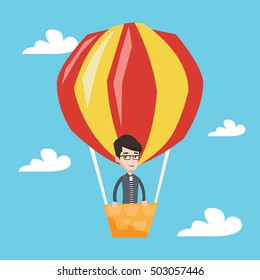 Happy Man Flying In A Hot Air Balloon. Caucasian Man Standing In The Basket Of Hot Air Balloon. Man Traveling In Aerostat. Man Riding A Hot Air Balloon. Vector Flat Design Illustration. Square Layout.