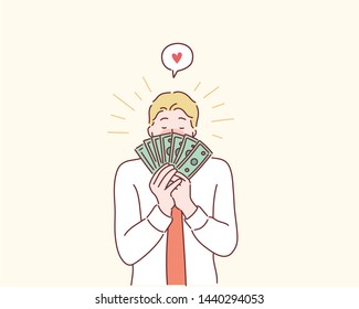 Happy man kissing dollar bill. Hand drawn style vector design illustrations.