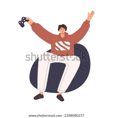 Happy man player with video game console in hand. Excited winner rejoicing after videogame win. Gamer with joystick controller sitting at home. Flat vector illustration isolated on white background