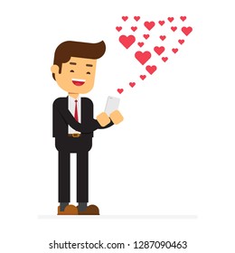 happy man sending love sms text message on mobile phone with red hearts flying away from screen,Valentines day