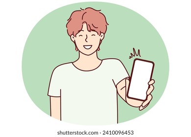 Happy man showing smartphone screen and smiling to recommend cool applications. Positive college age guy holding mobile phone with blank display boasts website. Flat vector illustration