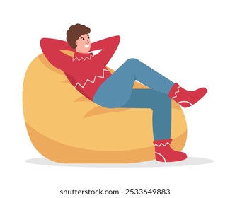 Happy man in warm clothes sitting in bean bag chair. Cozy Winter at home. Male Character at home in Snowy winter season or cold weather. Vector illustration isolated on white background.