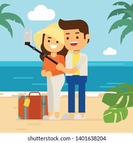 Happy man and woman at the beach in summer holiday,touristic couple on tropical island with their luggage making selfie