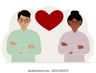 Happy man and woman next to a big red heart. Love.