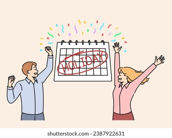 Happy man and woman stand near large calendar with inscription holiday, and celebrate beginning summer vacation. Overjoyed company employees happily wave hands upon learning that holiday approaching