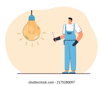 Happy mechanic standing next to huge lightbulb. Man in uniform repairing or changing bulb flat vector illustration. Repair service, maintenance concept for banner, website design or landing web page